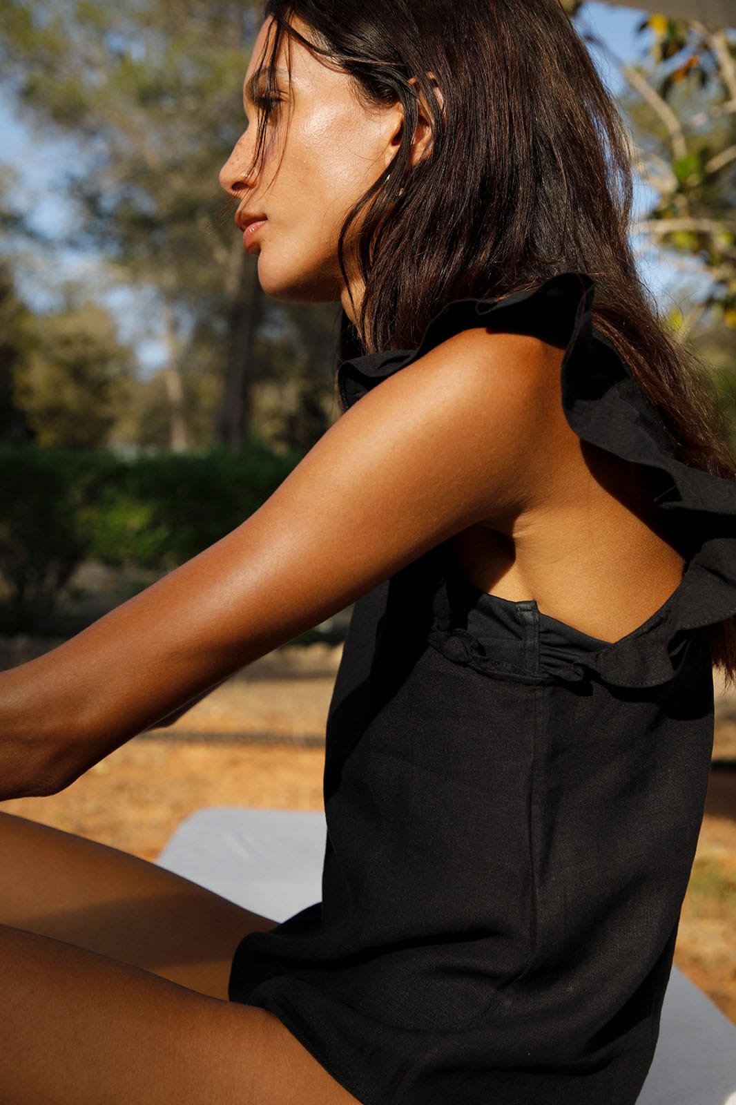 The Jeanne Ruffled Top in black
