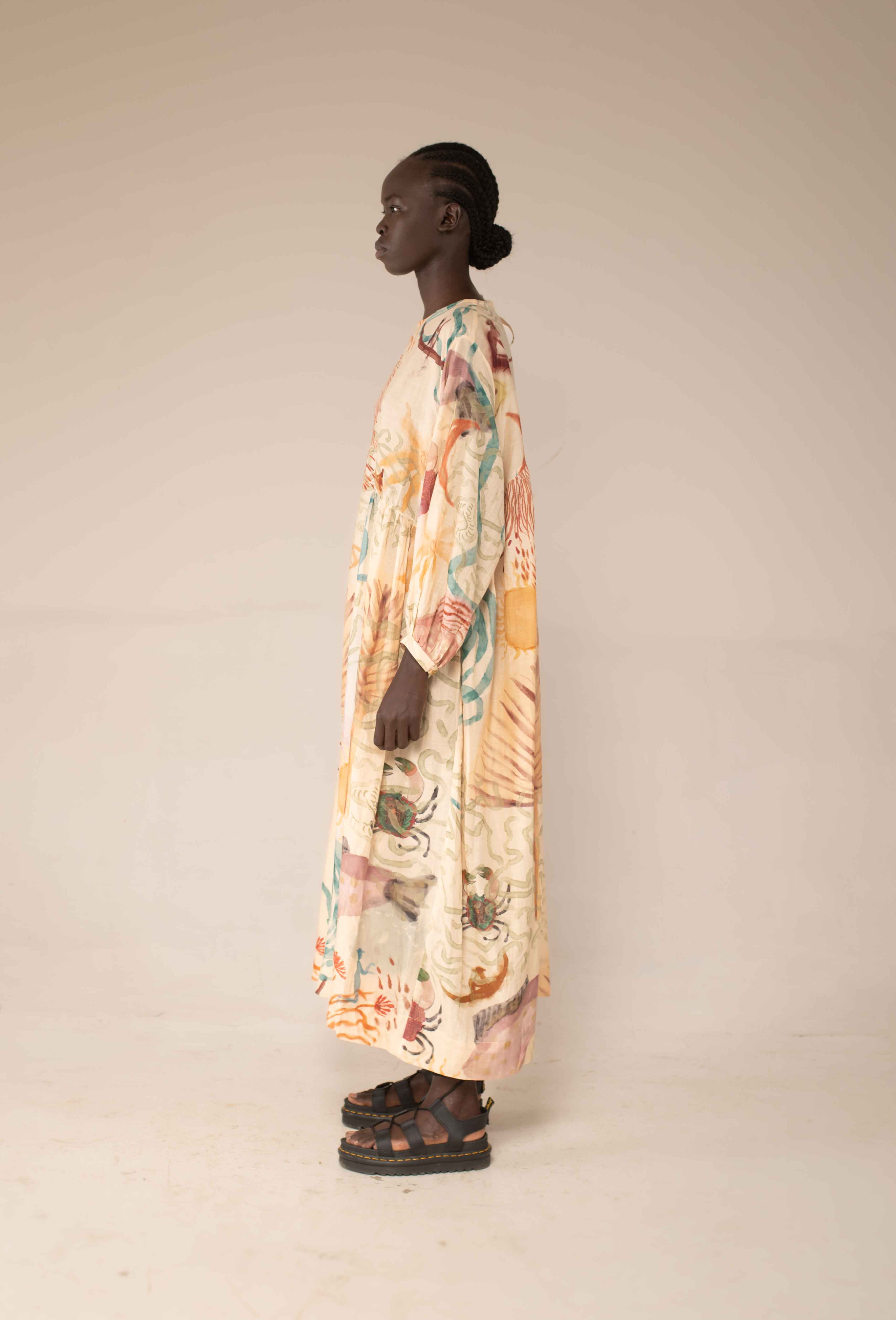 Balloon dress in Rain Collector print by Hamaji Studio - side view showing free-size silhouette and pocket detail