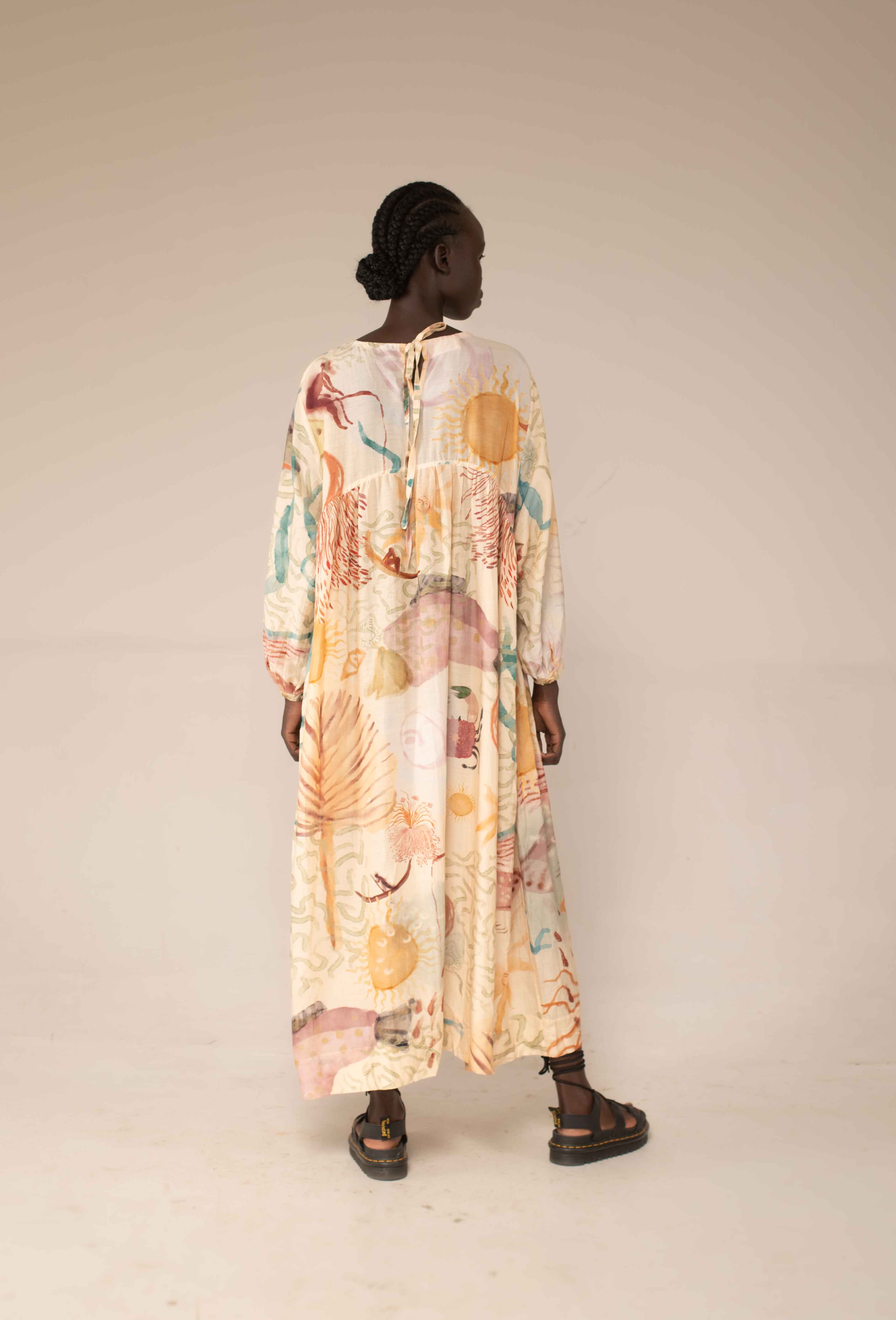 Balloon dress in Rain Collector print by Hamaji Studio - back view showing tie-back waist and bell sleeve detail