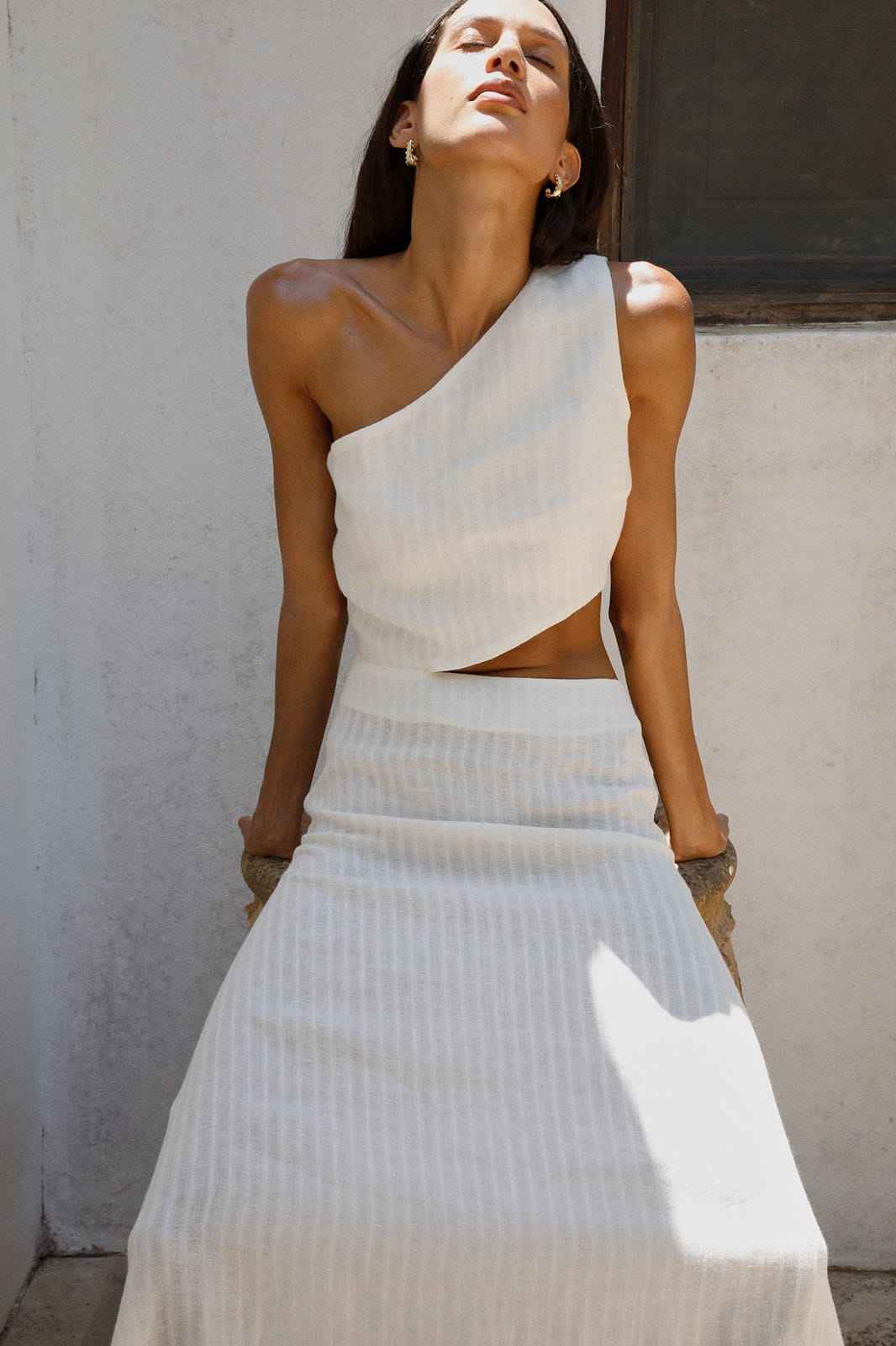 The Ava Asymmetric Maxi Dress in off-white