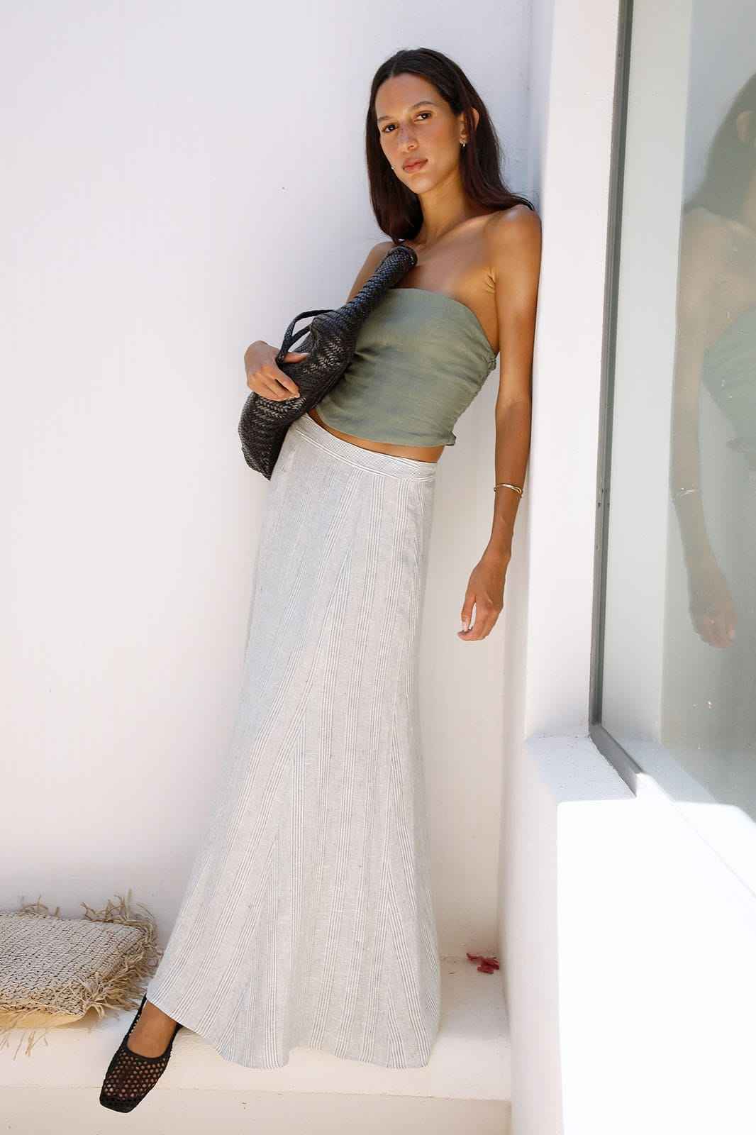 The Arabella Bias-Cut Maxi Skirt in striped olive green